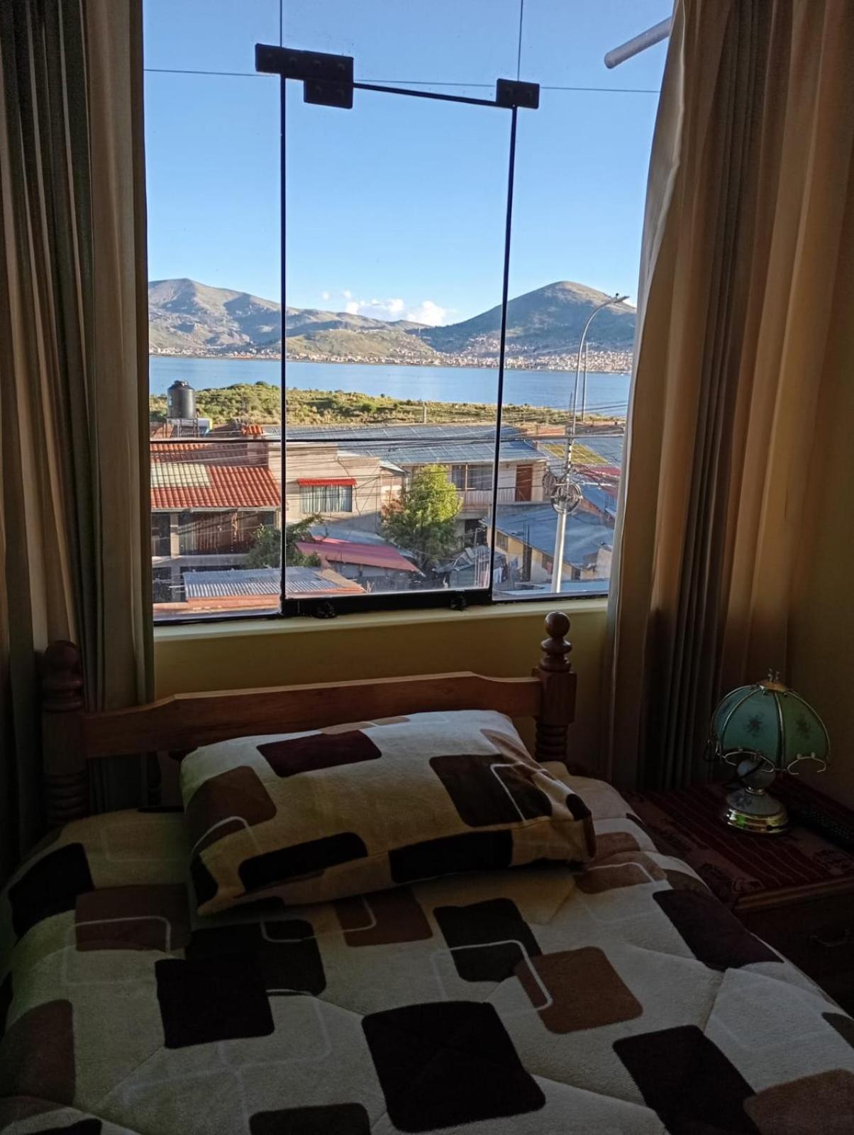 Hostal Vista Al Lago Titicaca Puno Exteriör bild